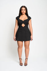 Moira Mini Dress in Black – Dramatic curved hem mini with wave neckline | Tasha Godwin